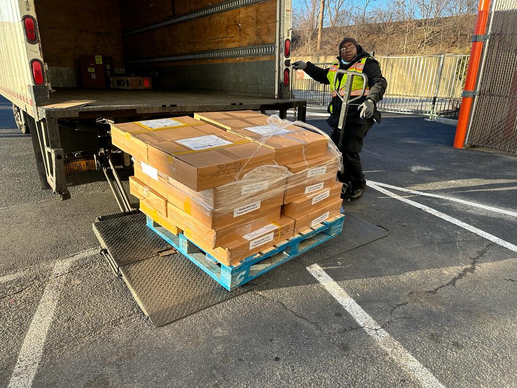 Packed AUKSales orders staged for UPS pickup