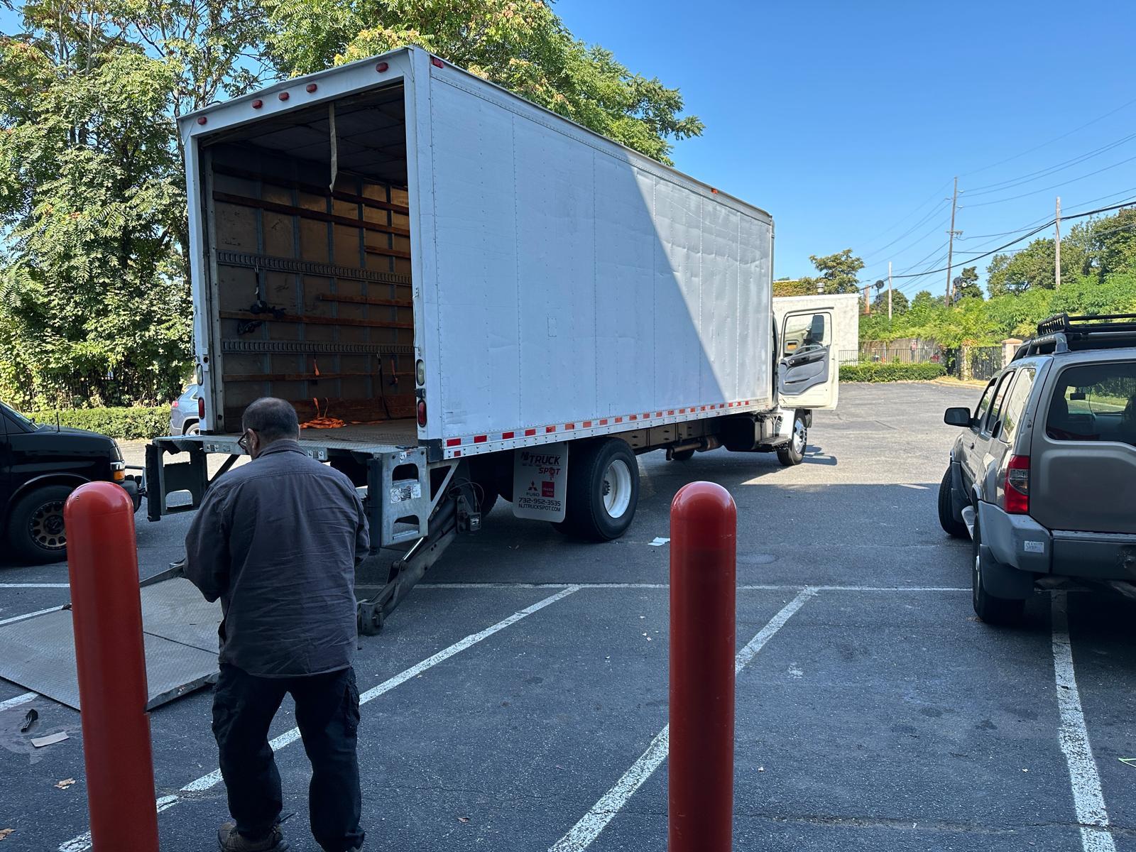 UPS delivery truck with a tracked AUKSales package
